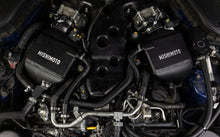Load image into Gallery viewer, Mishimoto intercooler kit for 2016+ Infiniti Q50/60 3.0T, showing the performance air-to-water intercooler with hoses and mounting components.
