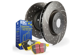 EBC Yellowstuff brake pads and drilled slot rotors installed on a vehicle for enhanced braking performance.