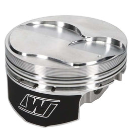 Wiseco SBC LS7 +2.5cc dome forged piston set for 8-cylinder engines, showing multiple pistons with polished surfaces and piston rings.