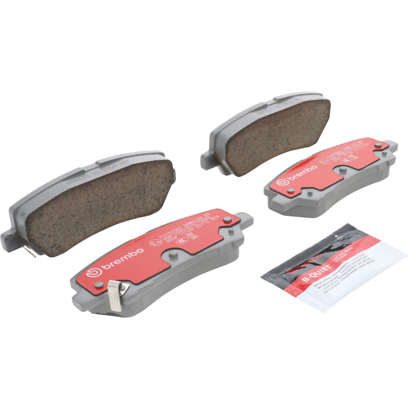 Brembo OE rear ceramic brake pads for Ford Mustang 2014-2023, showing the brake pad set with clear details and branding.