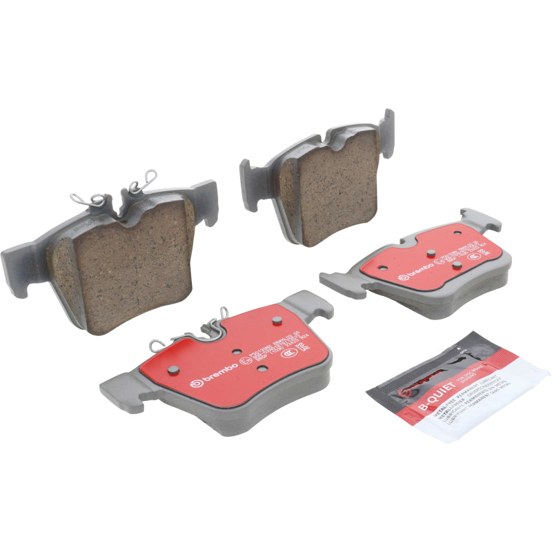 Brembo OE rear ceramic brake pads for Mercedes-Benz C-Class W205, showing the brake pad with detailed friction surface.