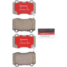 Load image into Gallery viewer, Brembo OE ceramic rear brake pads for 2007+ Cadillac CTS and 2009-2015 Chevrolet Camaro, showing the brake pad design.
