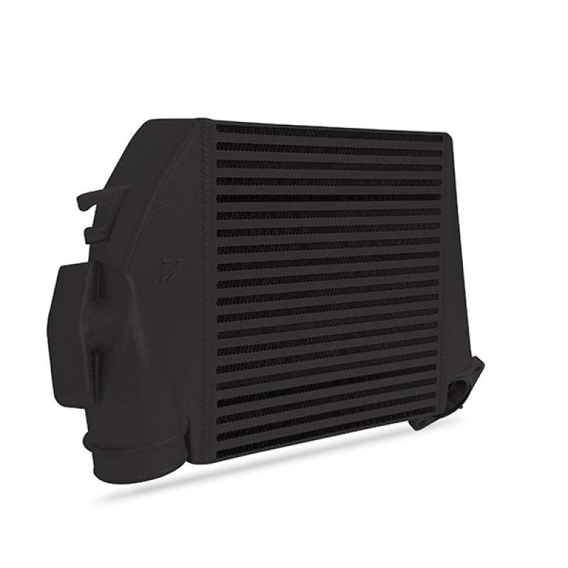 Mishimoto 08-14 Subaru WRX black top-mount intercooler kit with black hoses, mounted on engine bay for improved cooling and performance.
