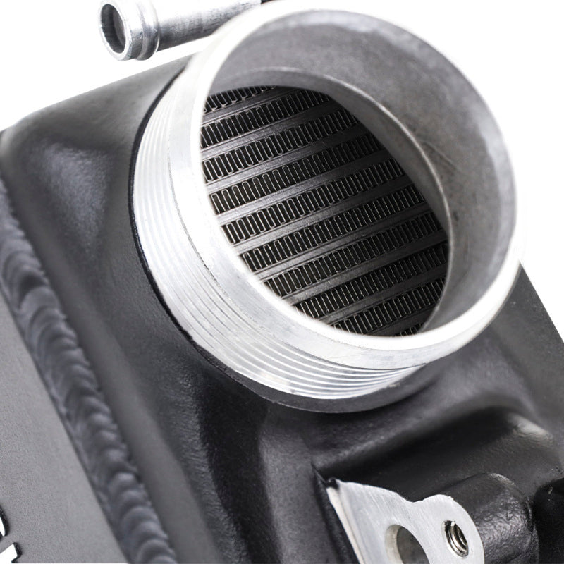 Mishimoto intercooler kit for 2016+ Infiniti Q50 and Q60 3.0T, showing the black aluminum intercooler with inlet and outlet connections.