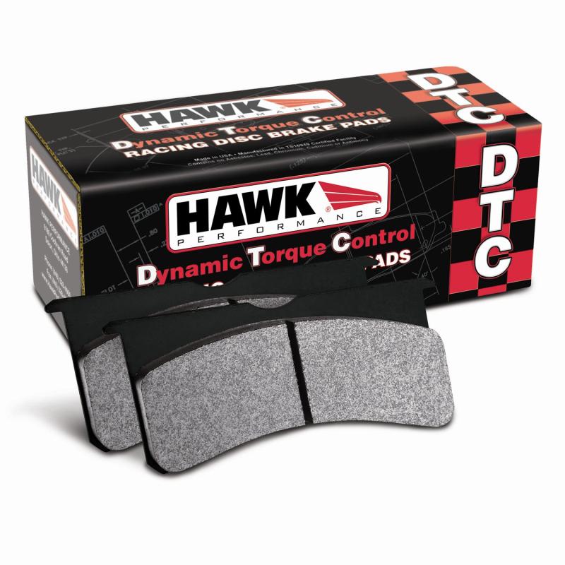 Hawk Performance DTC-70 racing rear brake pads for Infiniti FX50, Nissan G37, and 370Z, shown in a close-up view.
