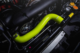 Mishimoto neon yellow silicone radiator coolant hose kit for 2015+ Subaru WRX, includes multiple flexible hoses for engine cooling.