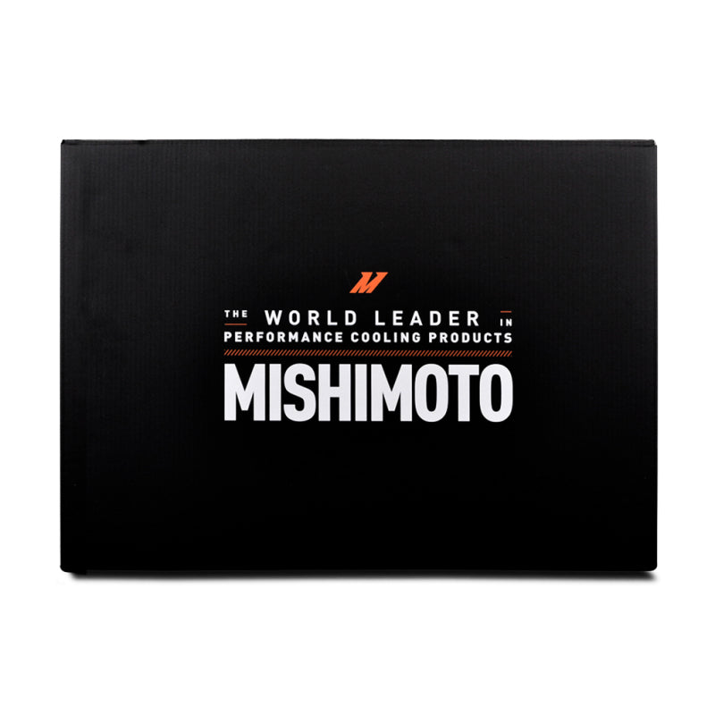 Mishimoto 2024+ Ford Mustang V8/2.3L aluminum radiator installed, showcasing its sleek design and cooling fins.