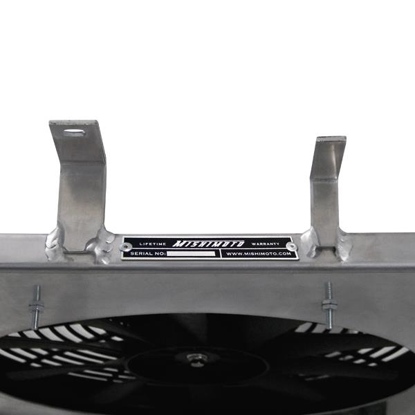 Mishimoto aluminum fan shroud kit for 1994-1996 Ford Mustang, engine bay with fan shroud installed, no ABS components visible.