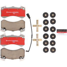 Brembo OE ceramic front brake pads for Audi A6 C7 and A8 D4, showing the brake pad set with metallic backing plates.