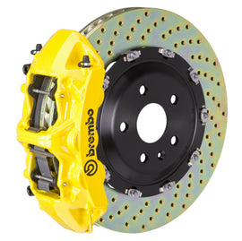 Brembo 20+ Corvette C8 rear GT BBK 6-piston cast 380x34mm drilled two-piece performance brake rotor in yellow.