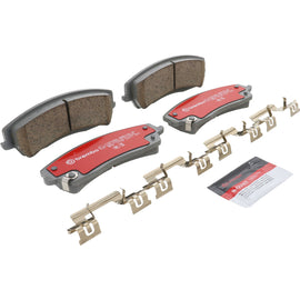 Brembo OE ceramic front brake pads for 2007+ Dodge Challenger and 2010+ Dodge Charger, showing the brake pad design and branding.