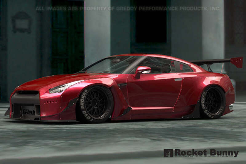 GReddy full Rocket Bunny wide-body aero kit with wing on Nissan GT-R R35 showing aggressive fender flares and aerodynamic design