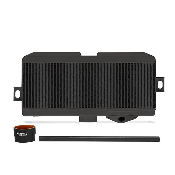 Mishimoto Subaru 08-15 WRX STi top-mount intercooler kit with black powder-coated intercooler and black silicone hoses.