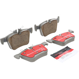 Brembo OE rear Xtra Ceramic brake pads for Mercedes-Benz C-Class W205, showing the black ceramic brake pad with metal backing plate.
