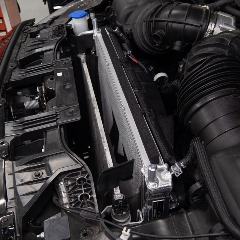 Mishimoto 2024+ Ford Mustang V8/2.3L aluminum radiator with core and tanks, designed for high-performance cooling.