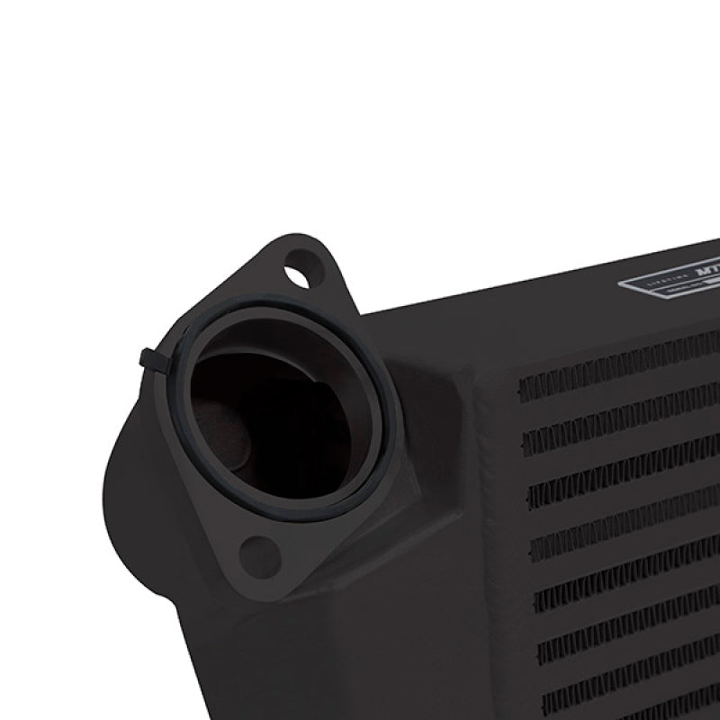Mishimoto 08-14 Subaru WRX top-mount intercooler kit with black powder-coated intercooler and black hoses installed.