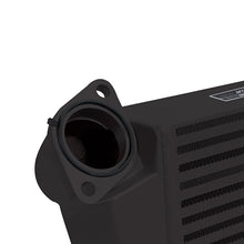 Load image into Gallery viewer, Mishimoto 08-14 Subaru WRX top-mount intercooler kit with black powder-coated intercooler and black hoses installed.