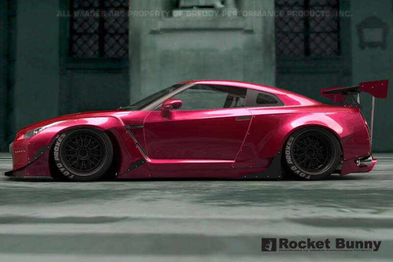 GReddy full Rocket Bunny wide-body aero kit with wing installed on Nissan GT-R R35, showcasing aggressive body modifications.