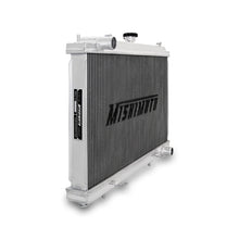 Load image into Gallery viewer, Mishimoto aluminum radiator for 1995-1998 Nissan 240sx S14 SR20DET engine, with aluminum fins and hoses attached.