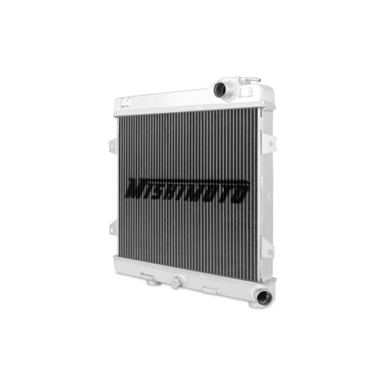 Mishimoto aluminum radiator for BMW E30 M3, 1987-1991, with sleek silver finish and visible cooling fins.