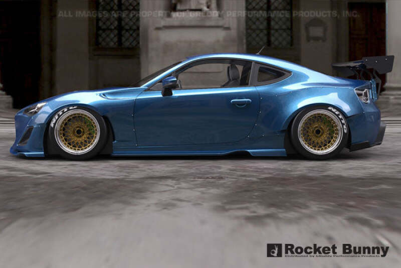 GReddy 13+ Scion FR-S wide body aero kit with Rocket Bunny design, featuring front and rear bumper modifications and side skirts.