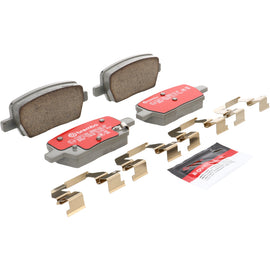 Brembo OE ceramic rear brake pads for 2016+ Cadillac XT5 and 2015+ Chevrolet Camaro, with visible brake pad surface and backing plate.