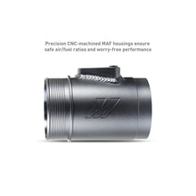 Load image into Gallery viewer, Mishimoto 2023+ Nissan Z performance cold air intake with modular rotomold design, showing the sleek intake components.