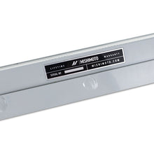 Load image into Gallery viewer, Mishimoto silver oil cooler for 2021+ BMW G8X M3 and M4, showing the sleek metal fins and mounting connections.