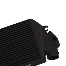Load image into Gallery viewer, Mishimoto black powder-coated top-mount intercooler kit for 2008-2014 Subaru WRX with black hoses, showcasing the intercooler and piping.
