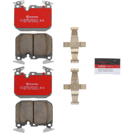 Brembo OE front ceramic brake pads for BMW 1-Series F21 and 3-Series F30/F80, showing the brake pad's surface and design.