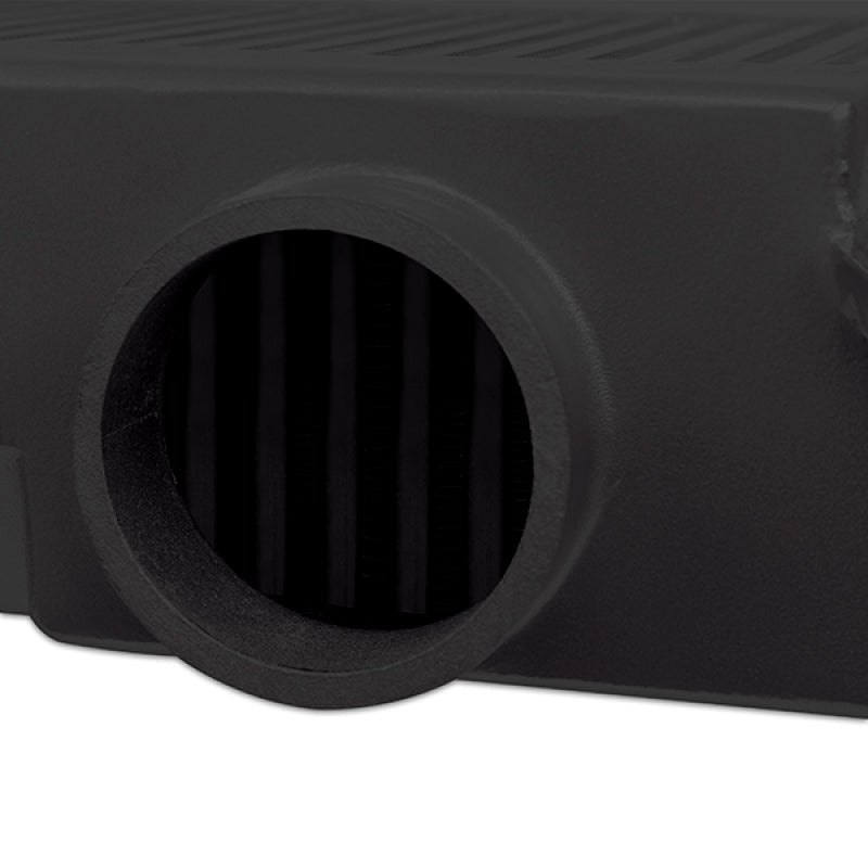 Mishimoto Subaru 08-15 WRX STi top-mount intercooler kit with black powder coating and black hoses, showing the intercooler and piping.