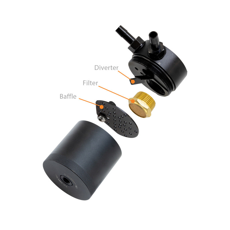Mishimoto 2022+ Subaru BRZ and Toyota GR86 baffled oil catch can kit installed in engine bay, featuring black canisters with hoses.