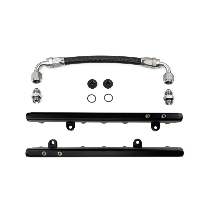 DeatschWerks Chevrolet LS2/LS3 fuel rails with crossover installed on engine, featuring metal finish and precise fit for performance vehicles.