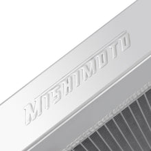 Load image into Gallery viewer, Mishimoto aluminum radiator for BMW E30 M3 87-91 manual transmission, featuring sleek silver design and cooling fins.