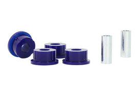SuperPro WRX rear trailing arm bushing kit with black rubber bushings for Subaru WRX suspension upgrade.