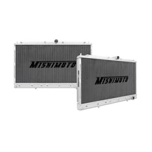 Load image into Gallery viewer, Mishimoto aluminum radiator for 1991-1999 Mitsubishi 3000GT Turbo, showcasing the sleek, lightweight design with core fins and inlet/outlet ports.