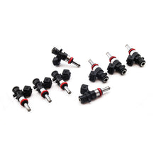 Load image into Gallery viewer, DeatschWerks 06-13 Chevy Corvette Z06 LS7 1200cc fuel injector set for 8-cylinder LS7 engine, showing eight high-performance injectors.