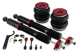 Air Lift Performance rear air suspension kit installed on a 1999-2006 BMW M3 E46, showing the air bags and suspension components.