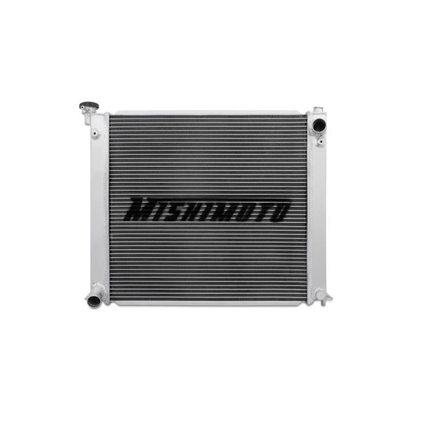 Mishimoto aluminum radiator for 1990-1996 Nissan 300ZX Turbo, featuring a sleek silver finish and fitting securely in the engine bay.