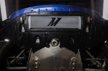 Load image into Gallery viewer, Mishimoto silver oil cooler for 2021+ BMW G8X M3 and M4, showing the sleek, compact cooling unit with mounting brackets.