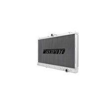 Load image into Gallery viewer, Mishimoto aluminum radiator for 1991-1999 Mitsubishi 3000GT Turbo manual transmission, showing the radiator with inlet and outlet ports.