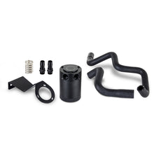 Load image into Gallery viewer, Mishimoto baffled oil catch can kit installed in a 2022+ Subaru BRZ or Toyota GR86, showing the black catch can with hoses attached.