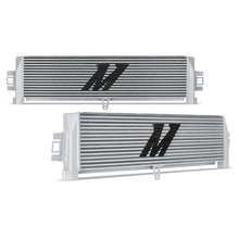 Load image into Gallery viewer, Mishimoto silver oil cooler for 2021+ BMW G8X M3 and M4, mounted with hoses and fittings visible on the engine bay.