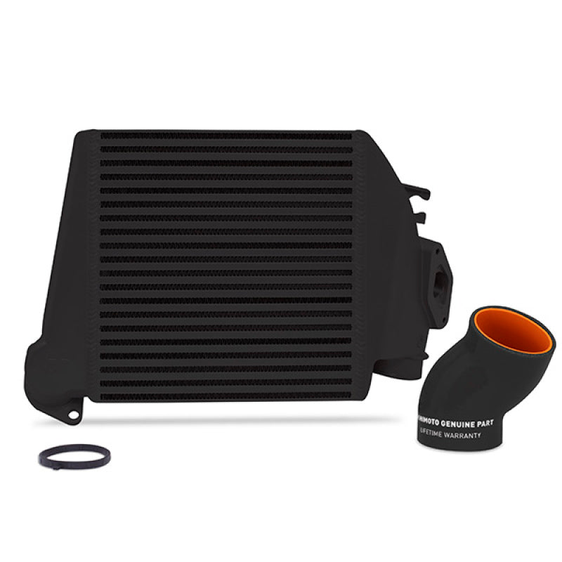 Mishimoto 2008-2014 Subaru WRX top-mount intercooler kit with black powder coating and black hoses, installed on engine bay.