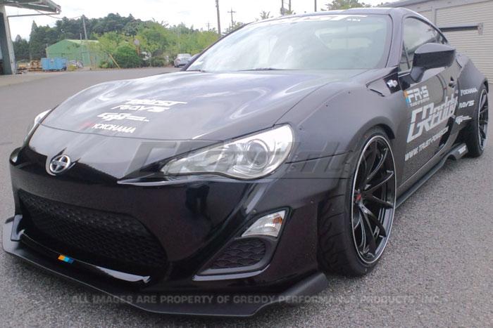 GReddy 13+ Scion FR-S wide body aero kit with custom front and rear fenders, side skirts, and bumper for enhanced sporty look.