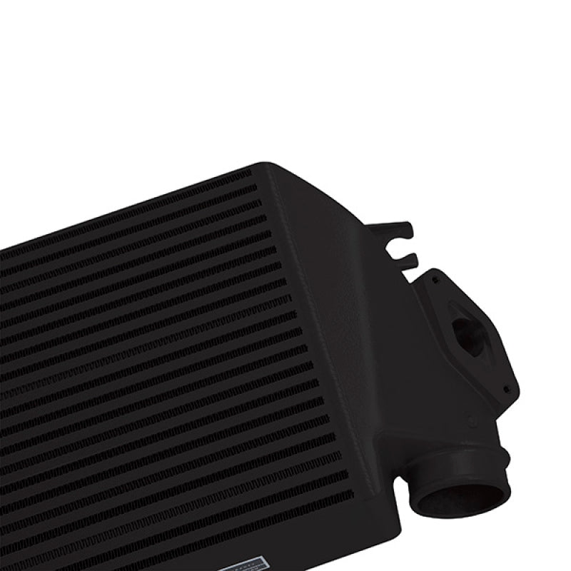 Mishimoto top-mount intercooler kit for 2008-2014 Subaru WRX with black powder coating and matching black hoses, installed on engine.