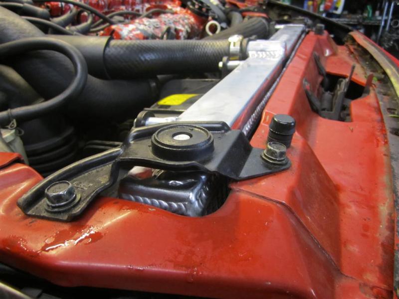 Mishimoto aluminum radiator for 1991-1999 Mitsubishi 3000GT Turbo, showing sleek silver finish and core design for optimal cooling.