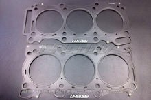 Load image into Gallery viewer, GReddy 09+ Nissan GTR R35 VR38DETT 0.8mm Thick 99mm Bore Metal Head Gaskets (Set of 2)