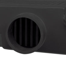 Load image into Gallery viewer, Mishimoto Subaru WRX STi 2008-2015 top-mount intercooler kit with black powder-coated intercooler and black hoses installed.