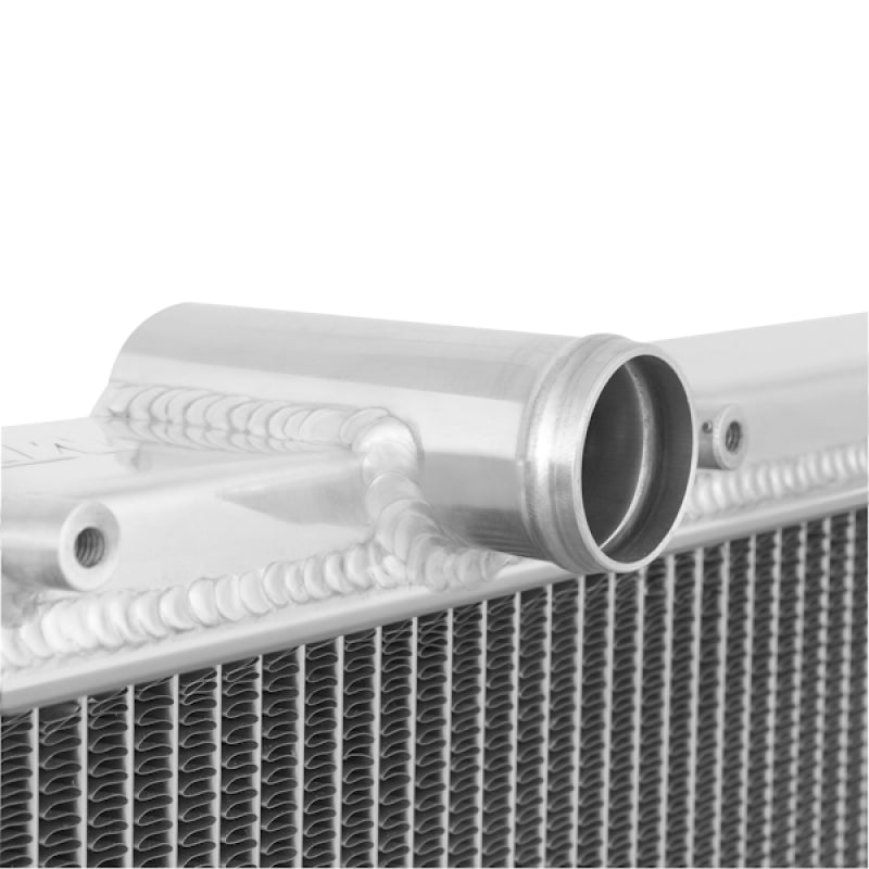 Mishimoto aluminum radiator for 1991-1999 Mitsubishi 3000GT Turbo, showing shiny, lightweight construction and core fins.